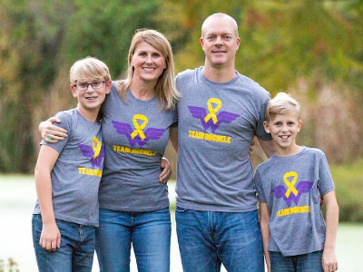 Pseudomyxoma Survivor Michele pictured with her family